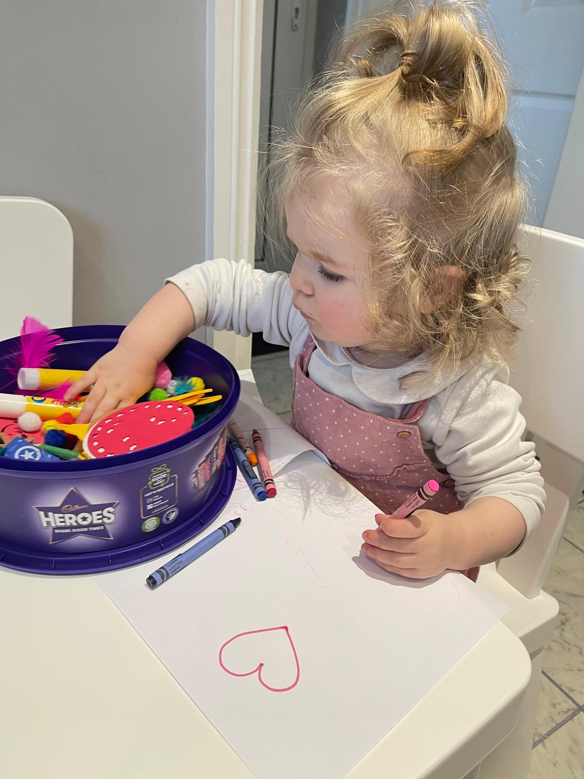 Playing in the colouring and crafts box