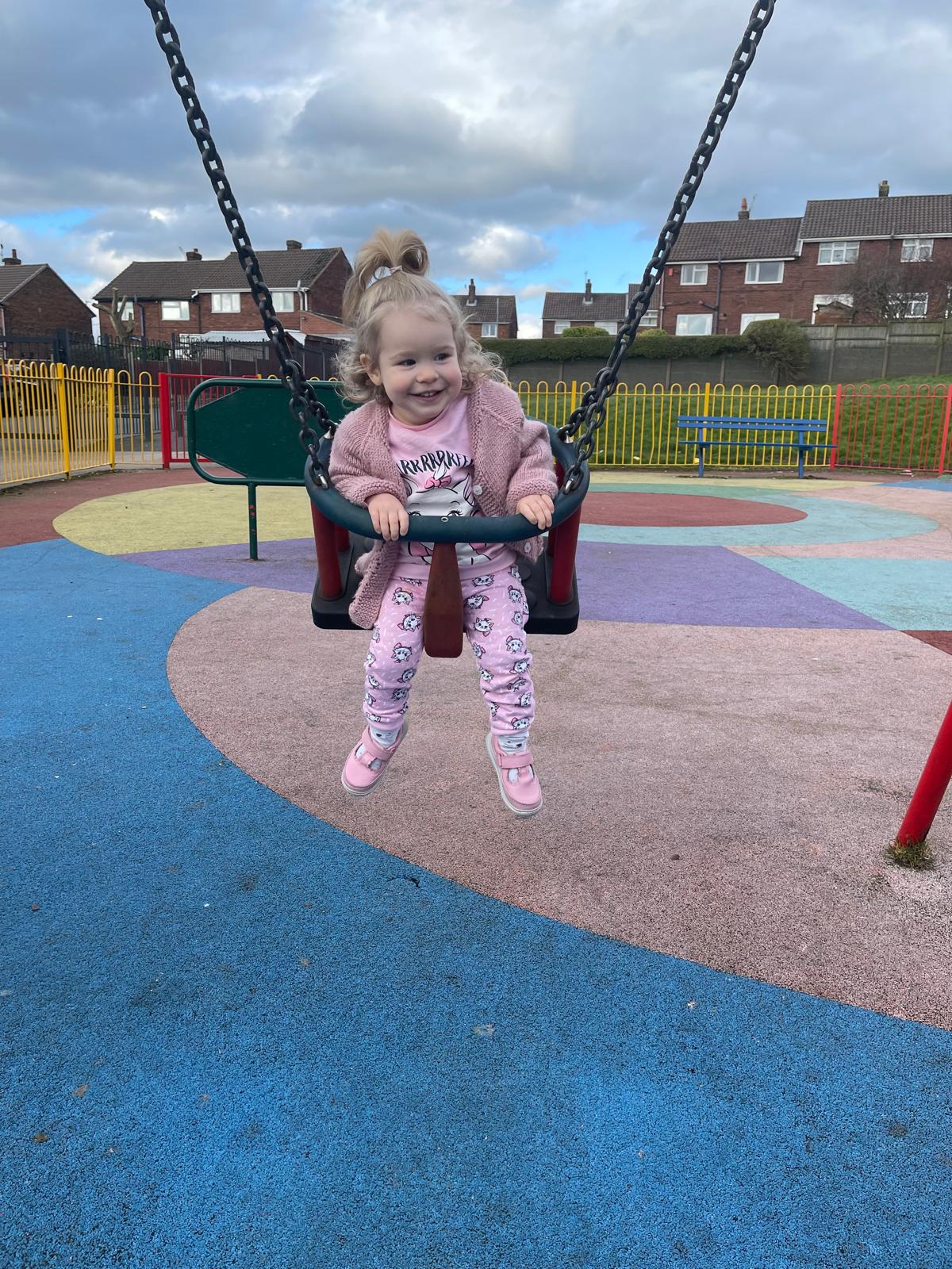 Playing on the swing